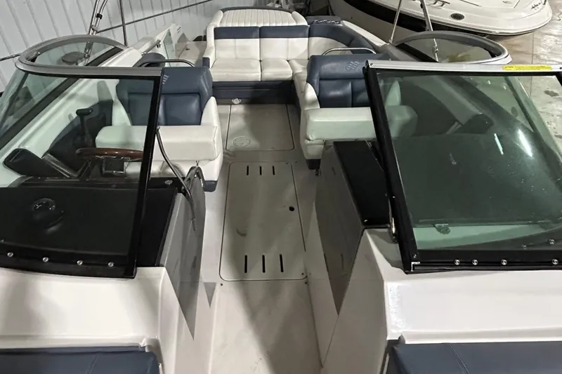 Slide: The Image of 2008 Four Winns 262 boat interior with seating and windshield. - 18