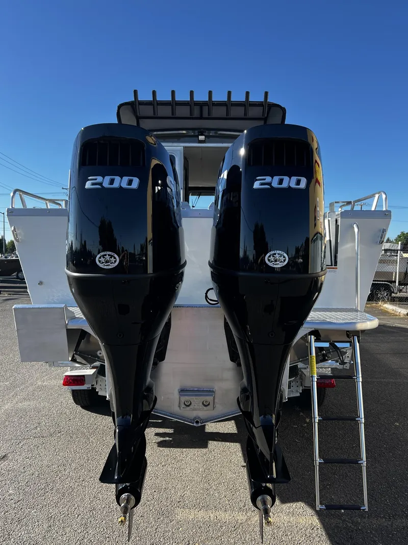 Slide: The Image of 2023 Thunder Jet 26 Pilot with twin 200 horsepower outboard motors. - 3