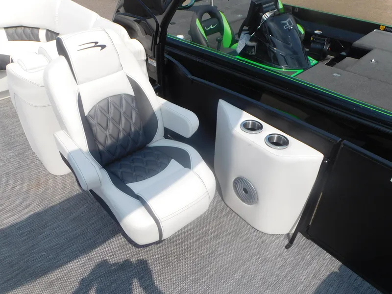 Slide: The Image of 2024 Bennington 23 RFBA boat interior with luxury seating and cup holders. - 9