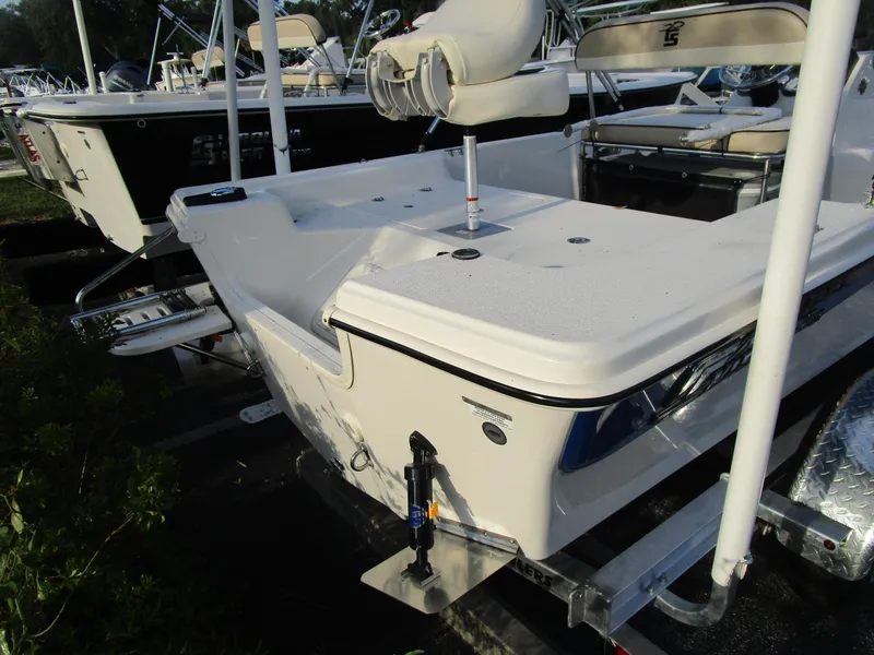 Slide: The Image of 2024 Carolina Skiff 192 JLS boat rear view with seating and deck features. - 5