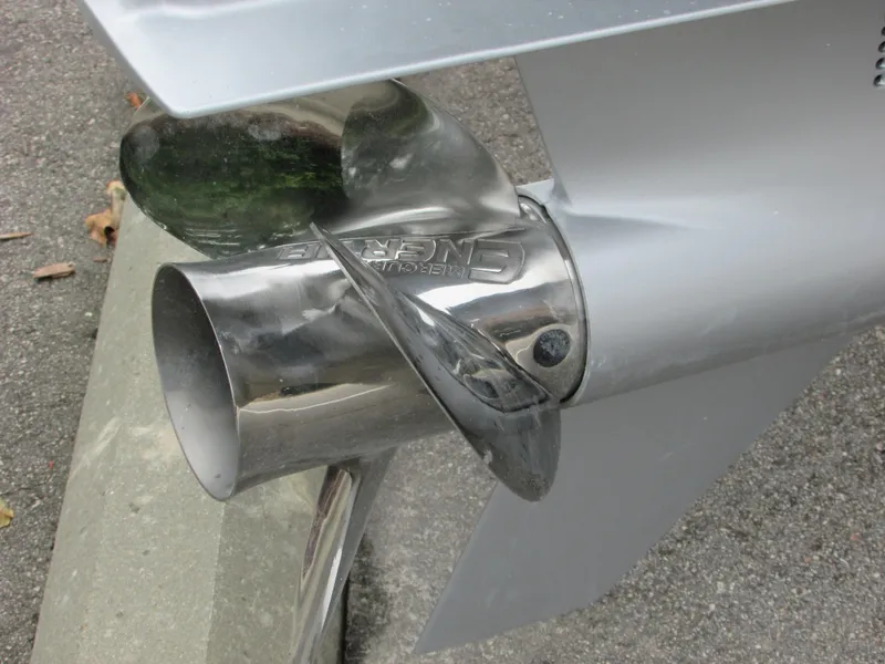 Slide: The Image of Close-up of a 2023 Mako 214 CC boat propeller. - 13