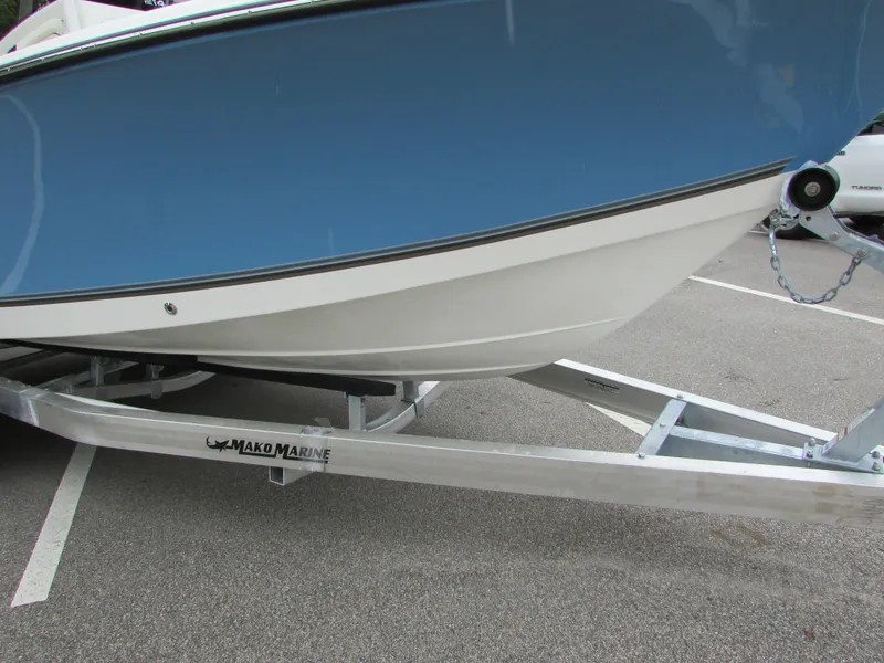 Slide: The Image of 2023 Mako 214 CC boat on a Mako Marine trailer. - 14