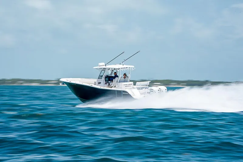 Slide: The Image of 2024 Sea Fox 328 Commander speeding on open water. - 11