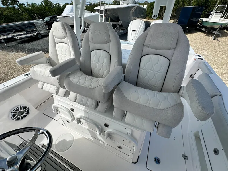 Slide: The Image of 2024 Sea Fox 328 Commander boat seats, featuring plush gray upholstery and ergonomic design. - 18