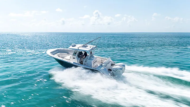 Slide: The Image of 2024 Sea Fox 328 Commander cruising on open ocean waters. - 2