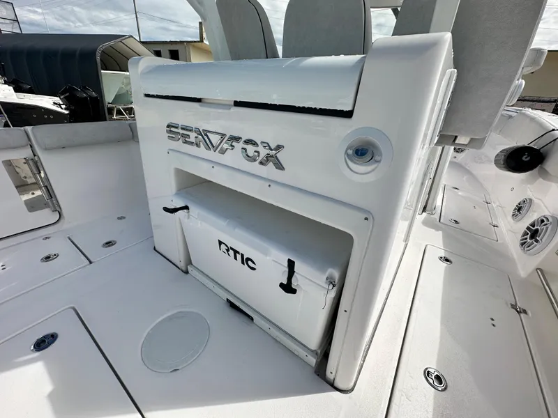 Slide: The Image of 2024 Sea Fox 328 Commander boat interior with RTIC cooler. - 21