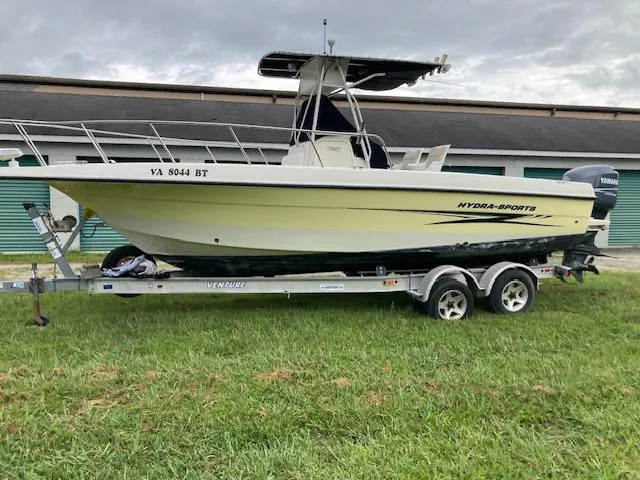 The Image of 2007 Hydra-Sports 2300 boat on trailer, parked on grass, overcast sky. - 0