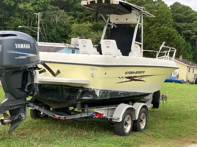 Slide: The Image of 2007 Hydra-Sports 2300 boat on trailer with Yamaha outboard motor, parked on grass. - 11