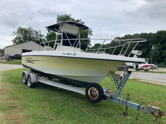 Slide: The Image of 2007 Hydra-Sports 2300 boat on trailer, parked on grass, overcast sky. - 15