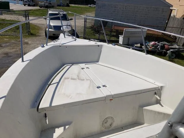 Slide: The Image of 2007 Hydra-Sports 2400 boat deck with storage compartments and railing. - 5