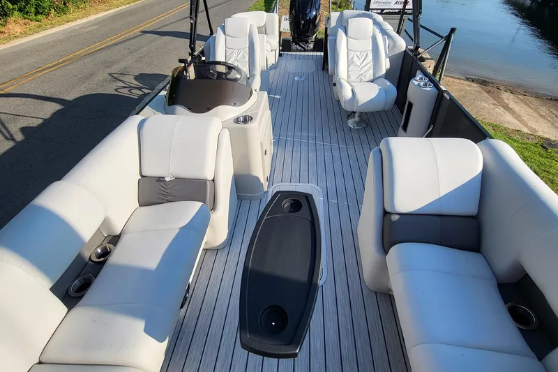 Slide: The Image of 2023 SunCatcher Fusion 322RC pontoon boat with spacious seating and modern design. - 15