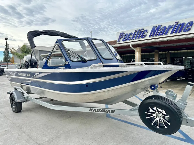 Slide: The Image of Thunder Jet 205 Rush w/ 150HP Mercury Pro XS and a 9.9 Mercury Kicker! 2023 - 8