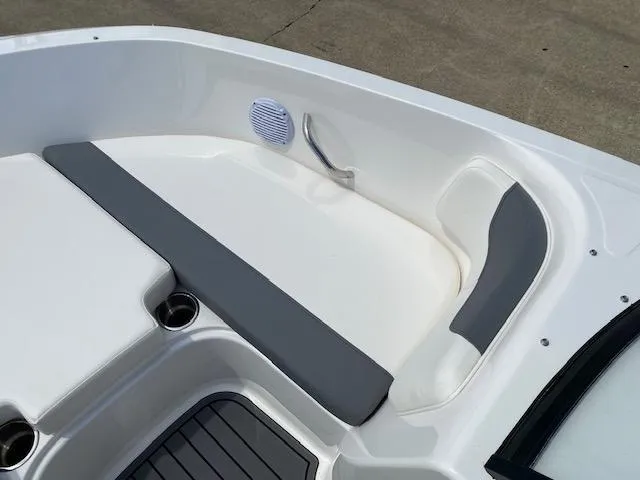 Slide: The Image of 2024 Bayliner Element E21 boat interior seating and speaker. - 11