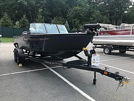 Slide: The Image of 2023 Ranger VS1882SC Angler boat on trailer in parking lot. - 4