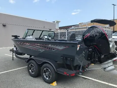 Slide: The Image of 2023 Ranger VS1882SC Angler boat on a trailer in a parking lot. - 5