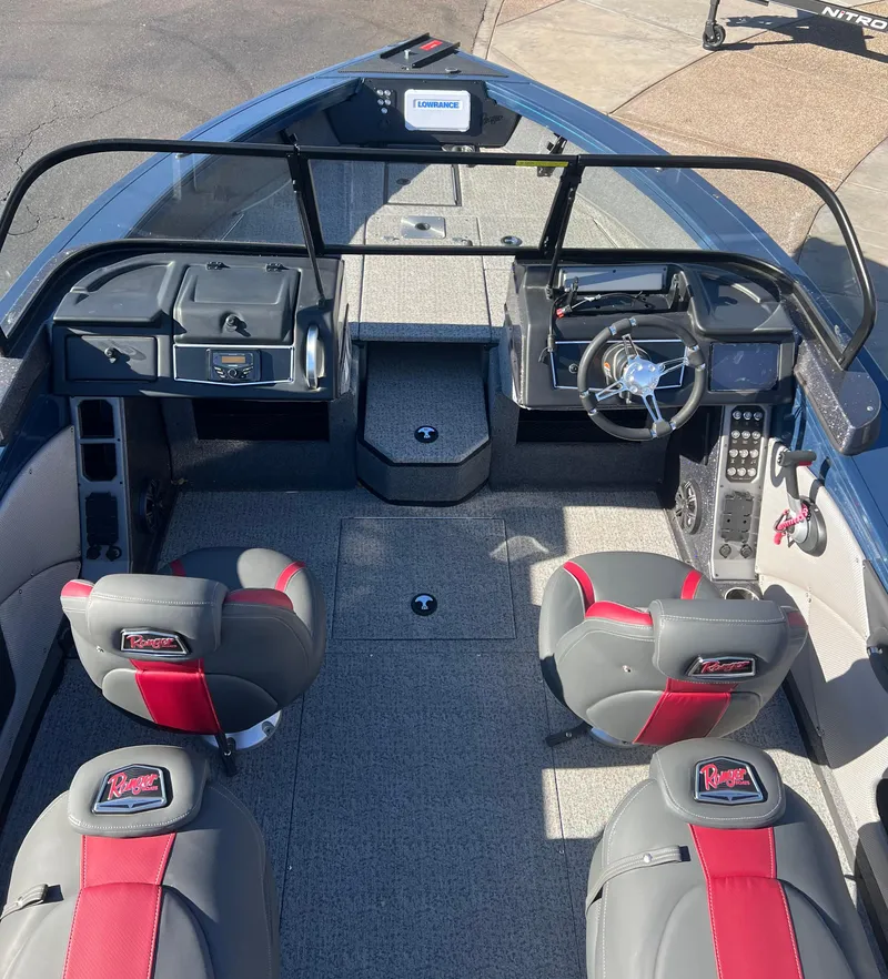 Slide: The Image of 2023 Ranger VX1788 WT boat interior with modern dashboard and seating. - 3