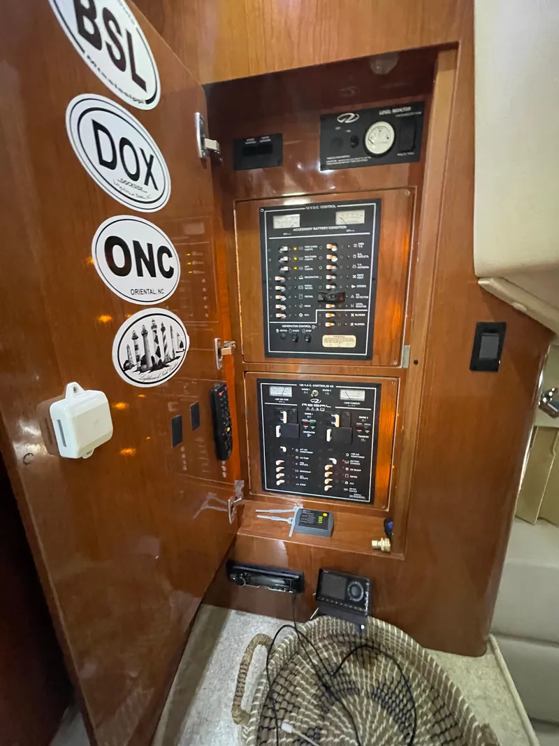 Slide: The Image of Electrical control panel inside a 2005 Regal Commodore 3560 IB boat. - 23