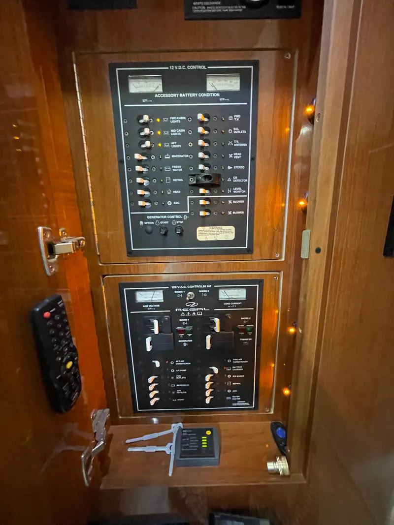 Slide: The Image of Electrical control panel of a 2005 Regal Commodore 3560 IB boat. - 24