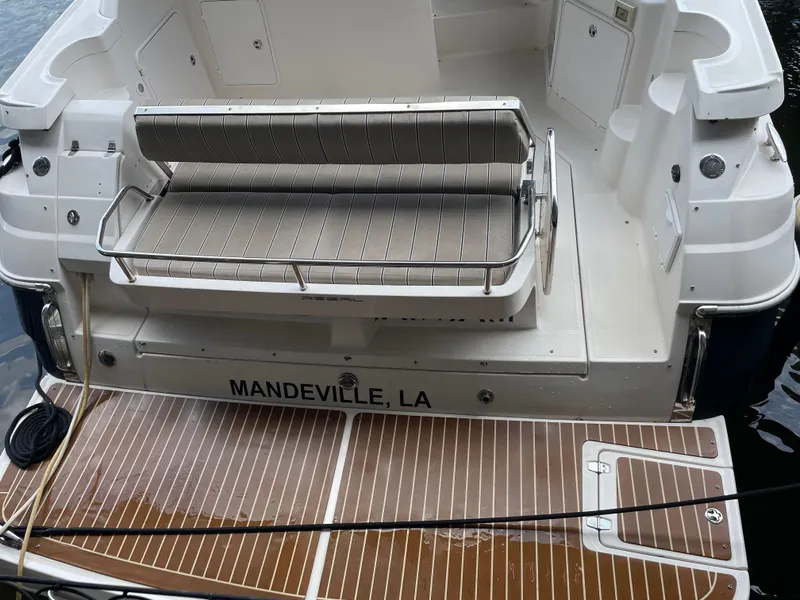 Slide: The Image of 2005 Regal Commodore 3560 IB boat stern with seating, docked in Mandeville, LA. - 37