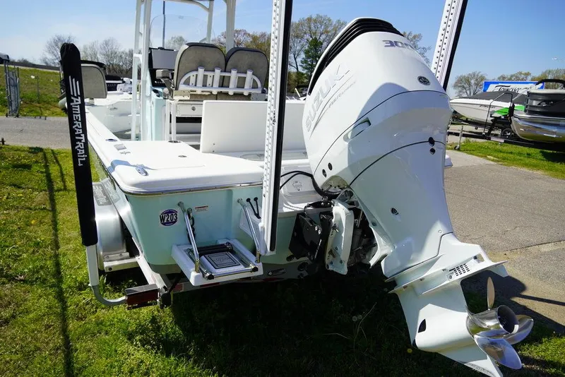 Slide: The Image of 2024 Sea Pro 248 DLX BAY boat with powerful outboard motor. - 4
