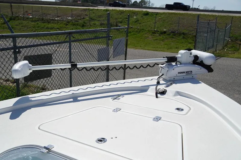 Slide: The Image of 2024 Sea Pro 248 DLX BAY boat with Minn Kota trolling motor. - 7
