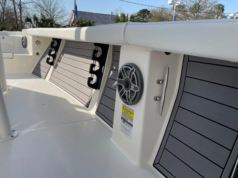 Slide: The Image of 2024 Pathfinder 2400 Open boat interior with speakers and storage compartments. - 14