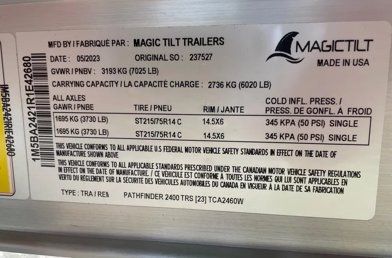 Slide: The Image of Magic Tilt Trailers label for 2024 Pathfinder 2400 Open, detailing specifications and safety standards. - 22