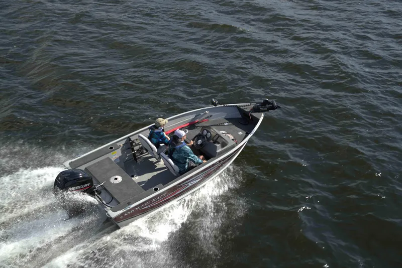 Slide: The Image of 2025 Smoker Craft 151 Resorter boat with Yamaha 25 hp engine on water. - 12