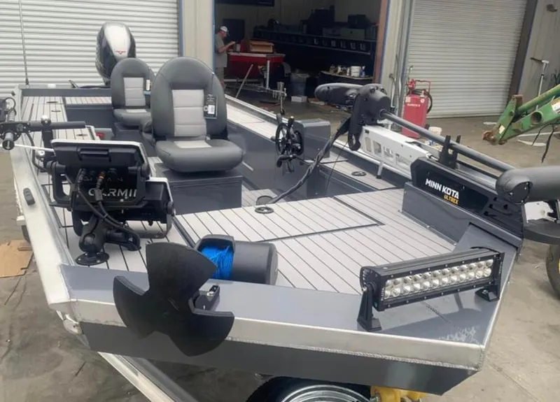 Slide: The Image of 2025 Custom 1860 Ultimate Panfish boat with advanced fishing gear and seating. - 8