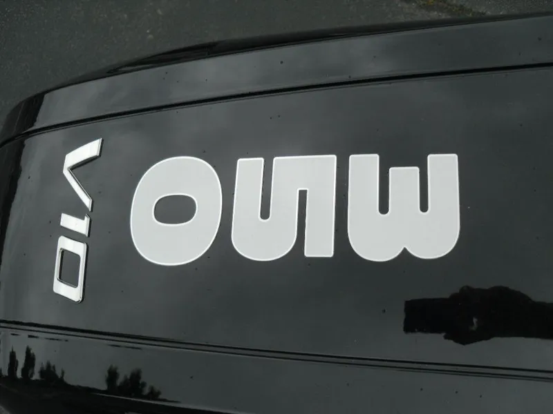 Slide: The Image of 2024 Regency 250 DL3 boat with V10 engine logo on black surface. - 24