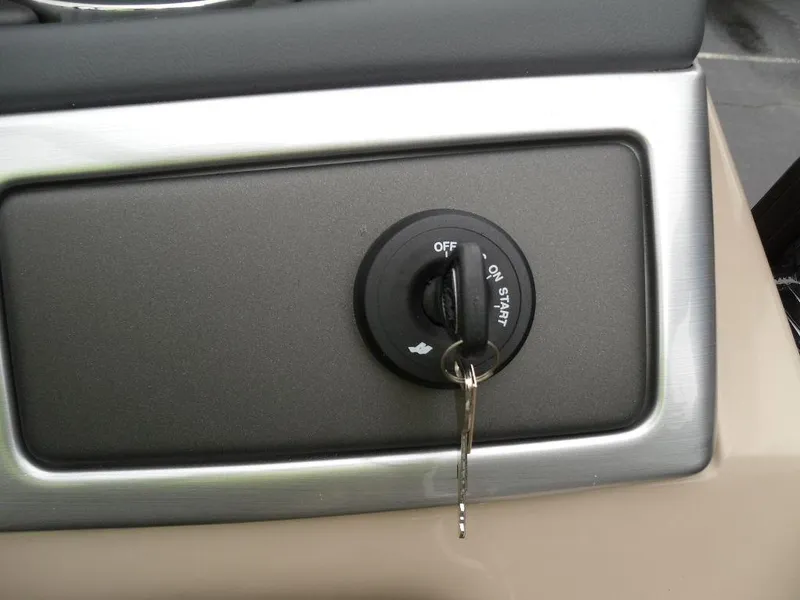 Slide: The Image of 2024 Regency 250 DL3 ignition switch with key inserted. - 29