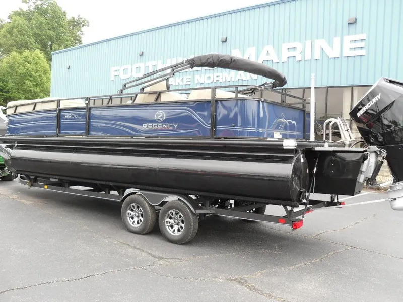Slide: The Image of 2024 Regency 250 DL3 pontoon boat on trailer at Foothills Marine. - 5