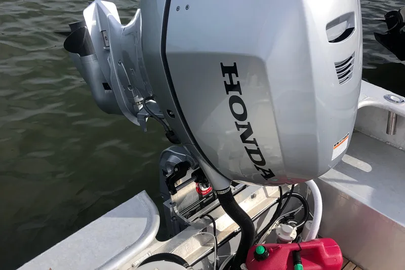 Slide: The Image of Honda outboard motor on 2021 Custom 19 Center Console boat. - 7