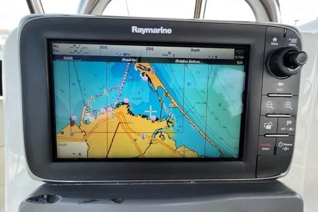 Slide: The Image of Raymarine navigation system on 2000 Silverton 392 Motor Yacht displaying nautical chart. - 14