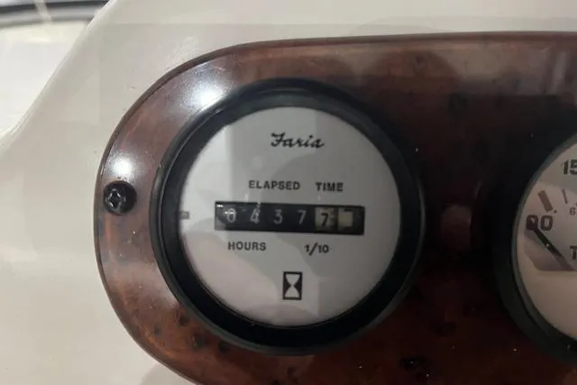 Slide: The Image of Elapsed time gauge on 2000 Silverton 392 Motor Yacht, showing 4377.1 hours. - 19