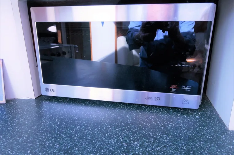 Slide: The Image of LG microwave on Silverton 392 Motor Yacht, 2000 model, with reflective surface. - 43