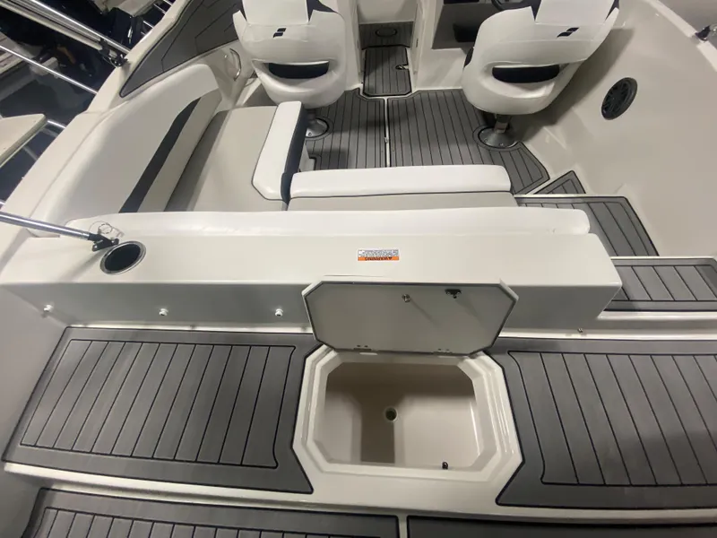 Slide: The Image of 2026 Starcraft SVX 210 boat interior with seating and storage compartments. - 15