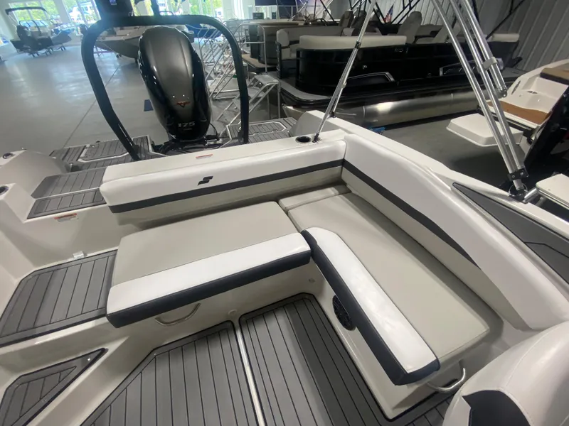 Slide: The Image of 2026 Starcraft SVX 210 boat interior with sleek seating and modern design. - 19