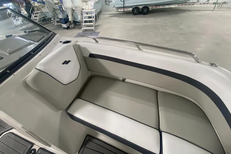 Slide: The Image of 2026 Starcraft SVX 210 boat interior with sleek seating and modern design. - 31