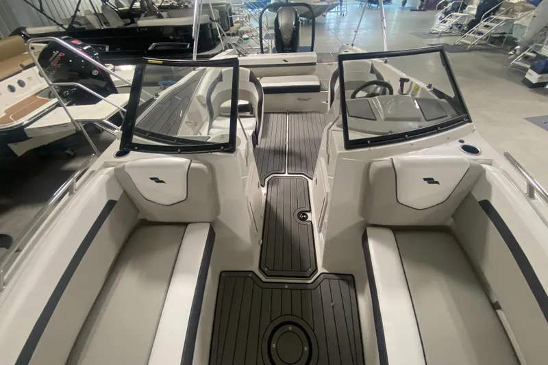Slide: The Image of 2026 Starcraft SVX 210 boat interior with sleek seating and modern design. - 35