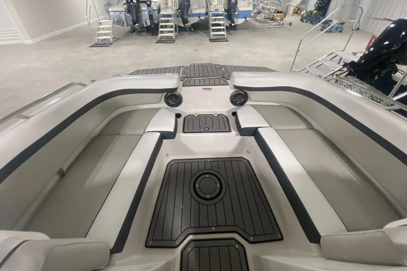 Slide: The Image of 2026 Starcraft SVX 210 boat interior with sleek seating and modern design. - 29