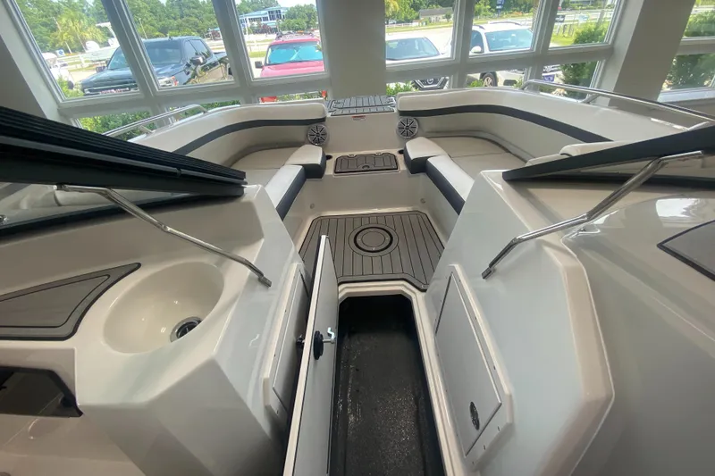 Slide: The Image of Interior of 2026 Starcraft SVX 190 boat with seating and storage compartments. - 11