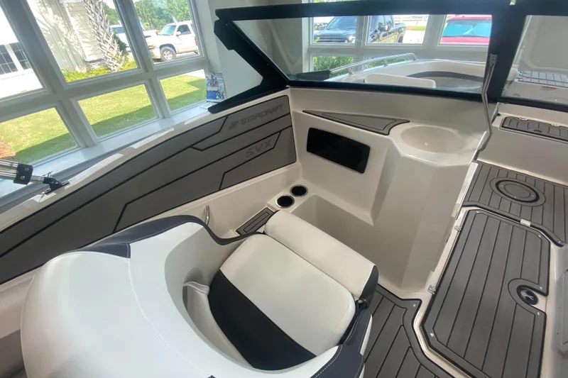 Slide: The Image of Interior of 2026 Starcraft SVX 190 boat with modern seating and sleek design. - 13
