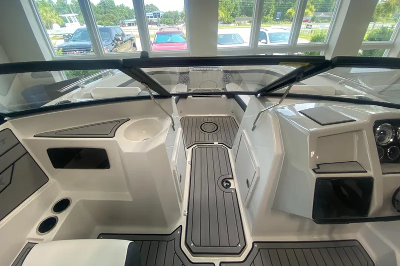 Slide: The Image of 2026 Starcraft SVX 190 boat interior with sleek design and modern dashboard. - 14