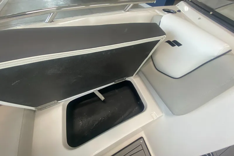 Slide: The Image of 2024 Starcraft SVX 190 boat with open storage compartment. - 17