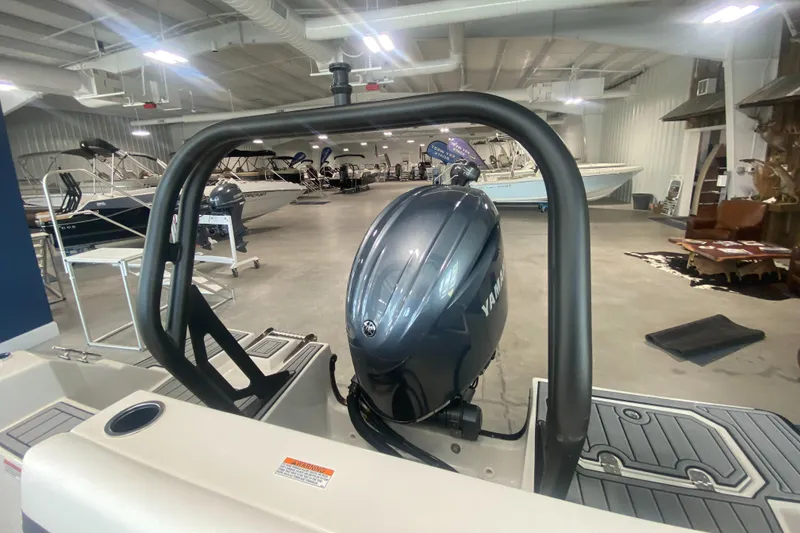 Slide: The Image of 2024 Starcraft SVX 190 boat with Yamaha outboard motor in showroom. - 20