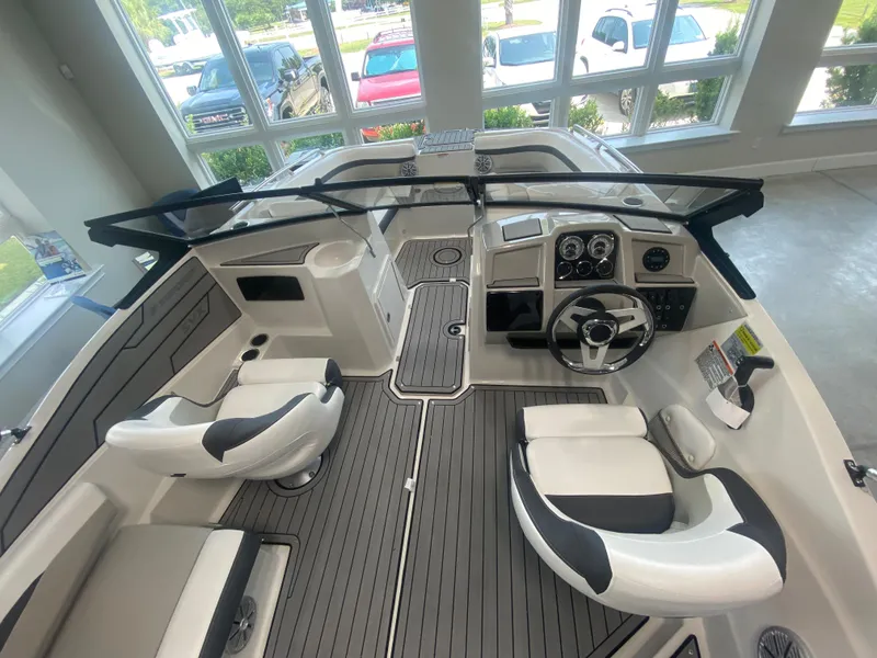 Slide: The Image of 2024 Starcraft SVX 190 boat interior with modern dashboard and seating. - 5