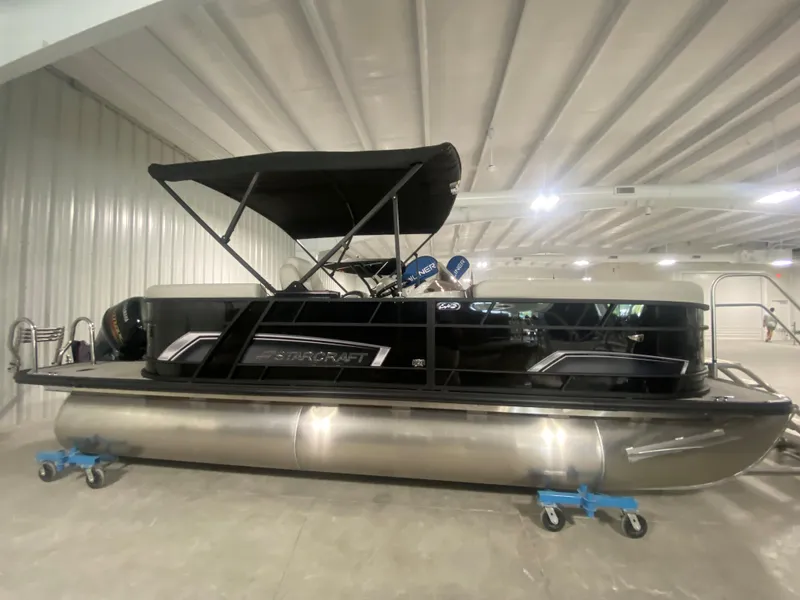 The Image of 2024 Starcraft EXS 1 pontoon boat in indoor storage. - 0