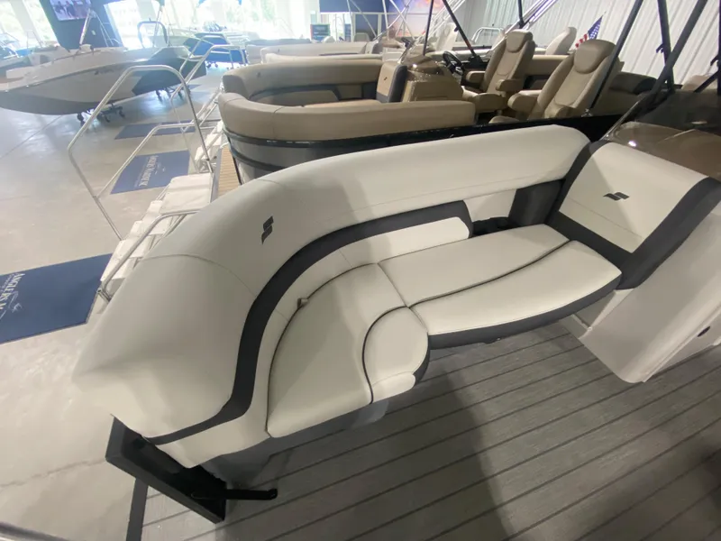 Slide: The Image of 2024 Starcraft EXS 1 boat interior with white and black seating. - 4