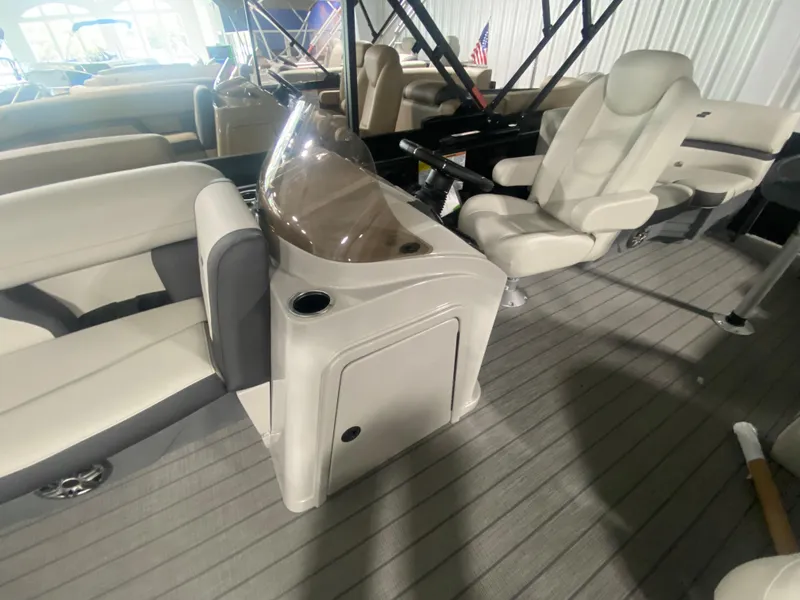 Slide: The Image of 2024 Starcraft EXS 1 boat interior with helm and seating. - 5